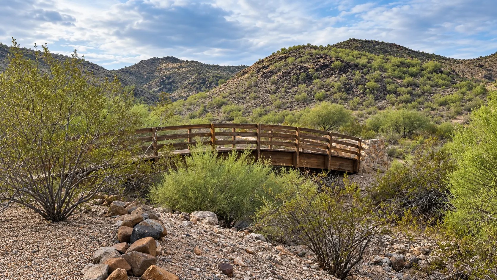 Wooden bridge crossing the desert landscape at the base of North Mountain near Shadow Rock in Phoenix, Arizona.