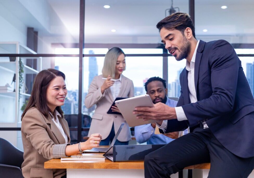 Team collaborating in a modern office setting.